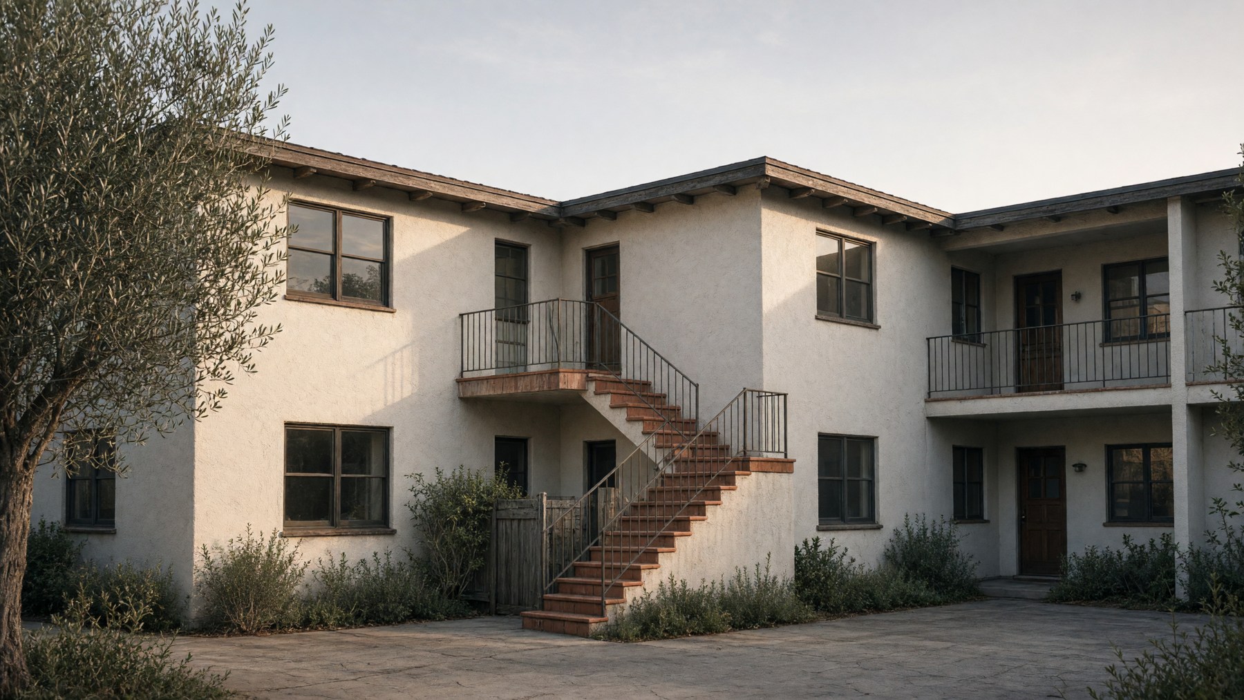AI-generated editorial illustration of two differently lit elevations of an anonymous lowrise apartment courtyard.